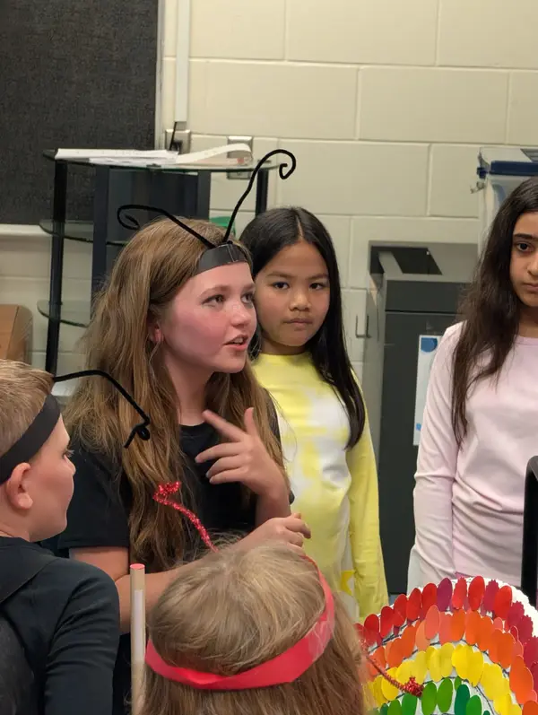 Team getting ready backstage with props